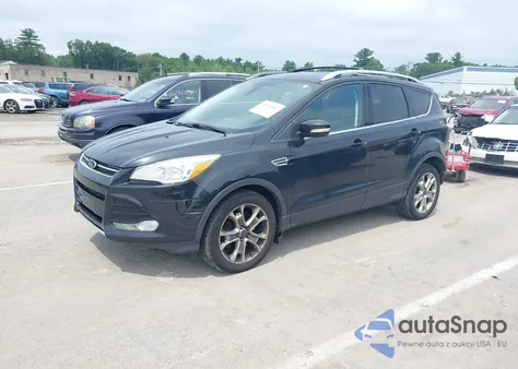 2014 Ford Escape Titanium z USA, uszkodzony, nr VIN 1FMCU9J92EUD19320